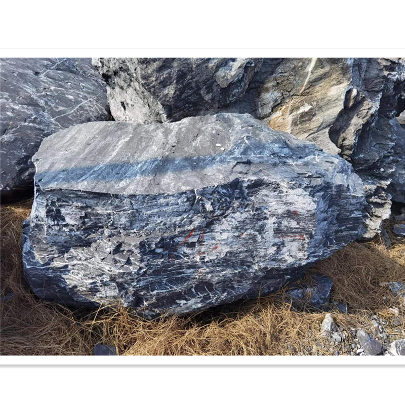 黑山石在园林景观中的多元应用 从假山制作到水溪驳岸点缀